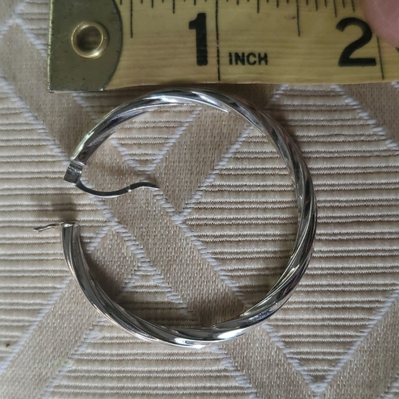 One Italian 14 karat gold white gold earrings from Costco . - Picture 2 of 6